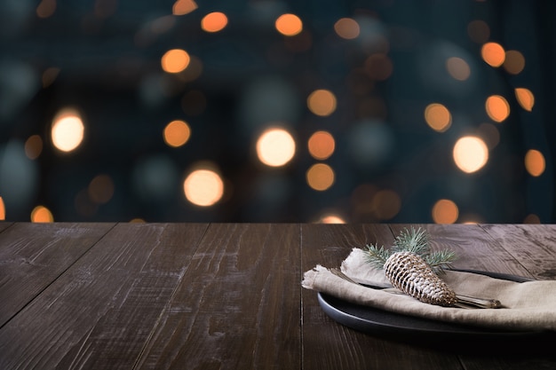 Christmas table setting and blurred kitchen