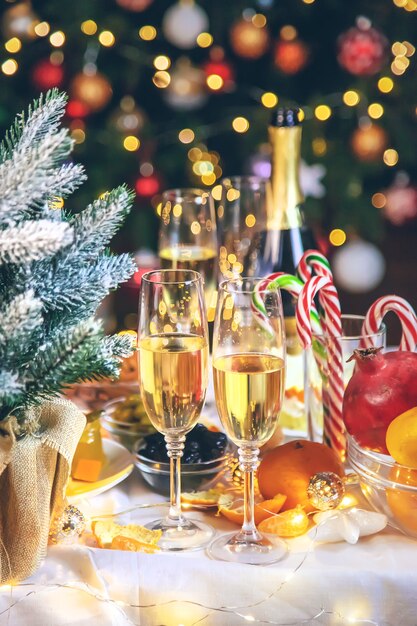 Christmas table with champagne and food.  