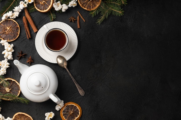 Christmas tea party on dark background with copy space