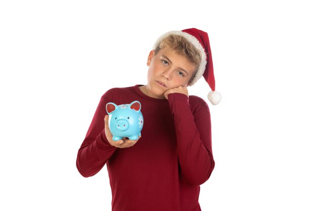 Christmas teen boy in Santa red hat isolated on white background