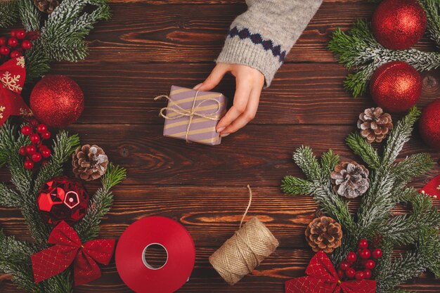 Christmas time. Process of packing gifts for holidays 