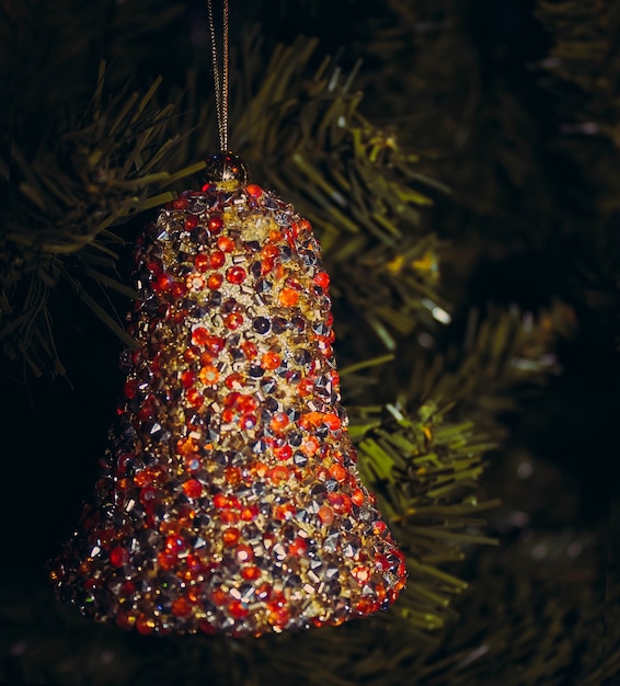 Christmas toy on the Christmas tree. Christmas decorations figurines and other ornaments that decorate a Christmas tree.