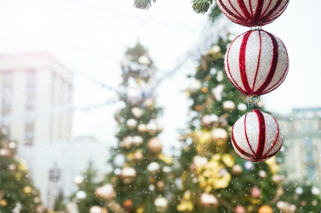 Christmas Toys Balls and Snowflakes on the Tree Christmas Fair.