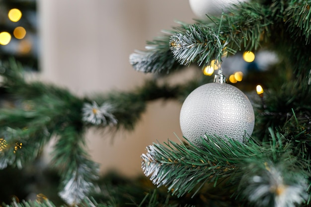 Christmas toys closeup on the christmas tree new year christmas\
tree decoration