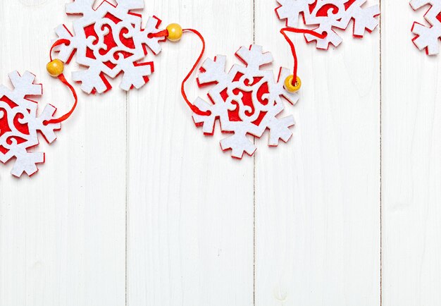 Christmas toys star on wooden background