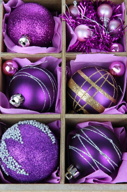 Christmas toys in wooden box close-up