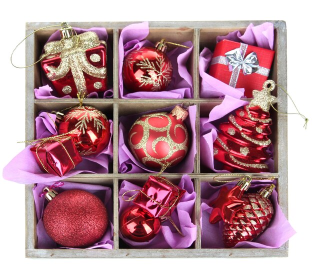 christmas toys in wooden box isolated on white