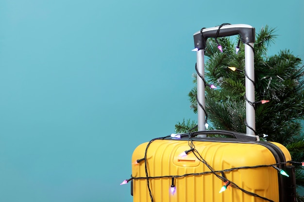 Christmas travel concept with luggage