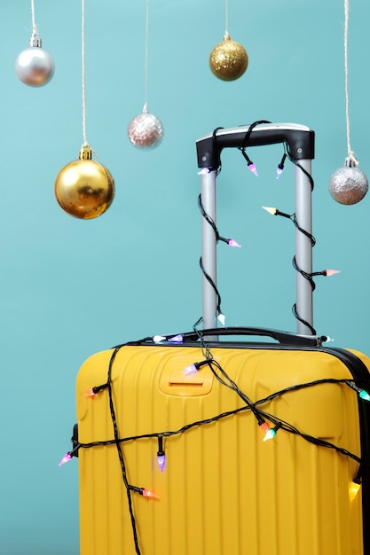 Christmas travel concept with luggage