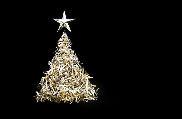 Photo christmas tree against black background