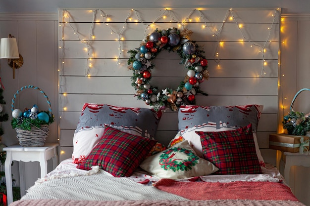 Christmas tree on bed at home