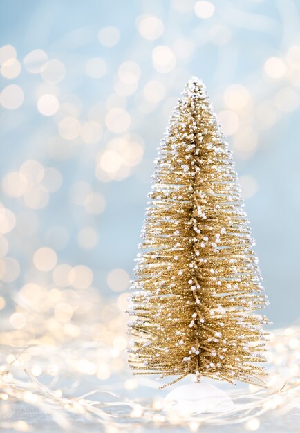 Christmas tree on bokeh background. Christmas holiday celebration concept. Greeting card.