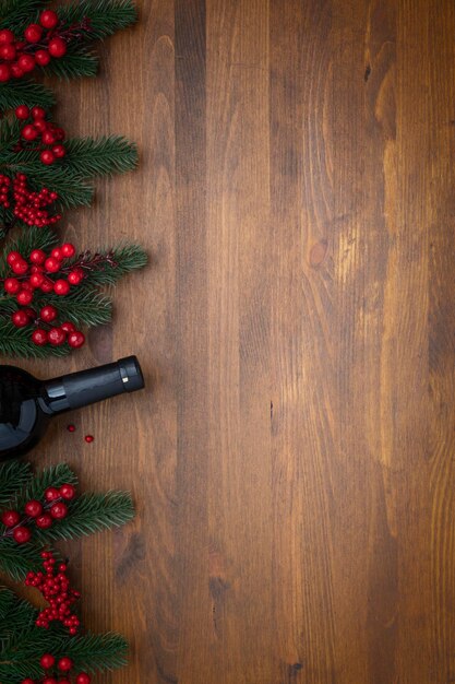 Christmas tree branches and viburnum with bottle