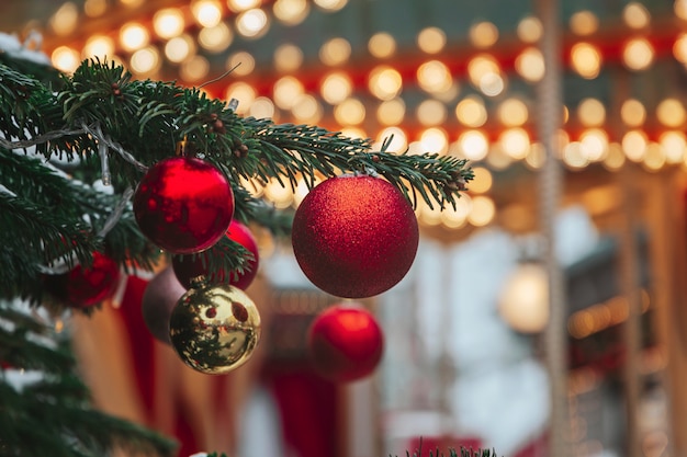 Christmas tree and Christmas decorations with snow, blurred