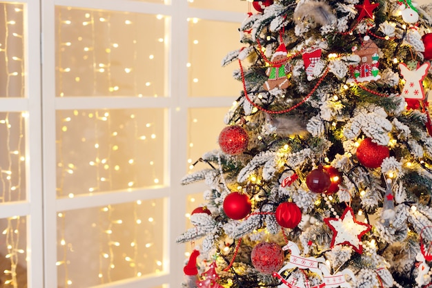 Photo christmas tree decorated with toys