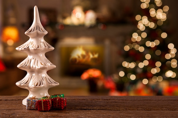 Christmas tree decoration on the table on a christmas blurry background.