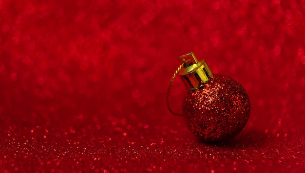 Christmas tree decorations on a shiny background. Vibratory focus.