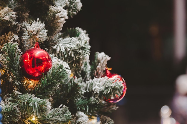 Christmas tree decorations with lights and red balls