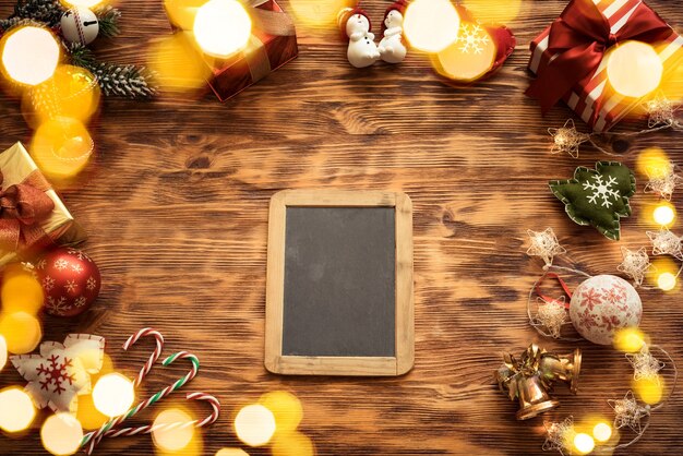 Christmas tree decorations on wooden table