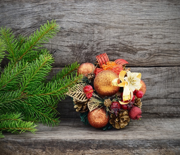 Christmas tree and gift on wooden background