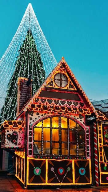 Christmas tree and gingerbread house stall on Cathedral square in Vilnius in Lithuania.