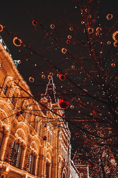 Christmas tree glowing branches in the street of Moscow Red Square Russia Festive atmosphere