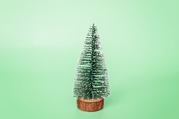 Christmas tree on green background