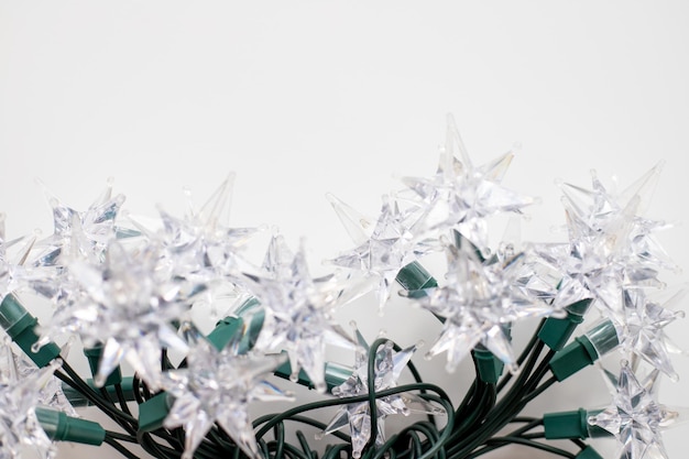 Christmas tree lights in the shape of a star on a white background