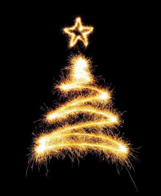 Photo christmas tree made by sparkler on a black background