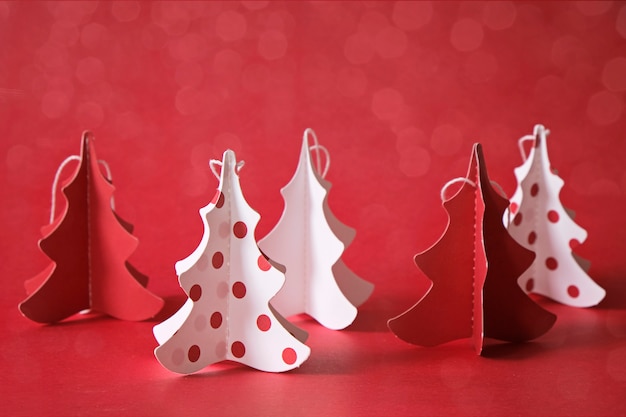 Christmas tree made from paper in white and red, decoration