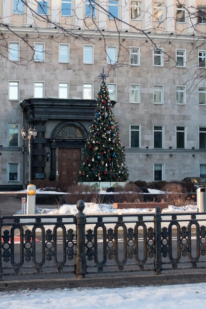 Christmas tree near the house Christmas facade decor