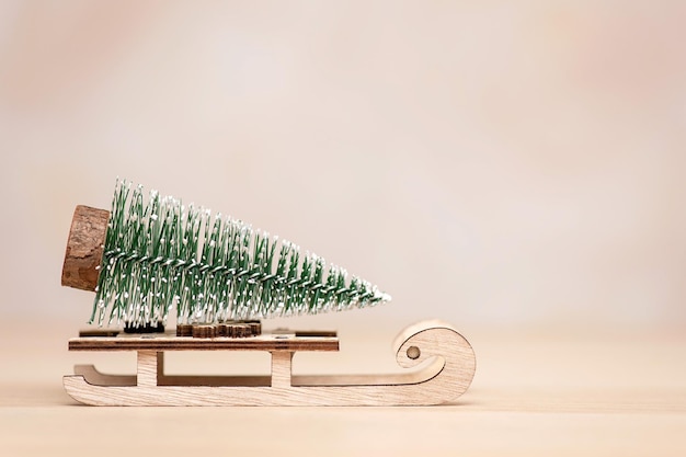 Christmas tree on old wooden sleigh, copy space