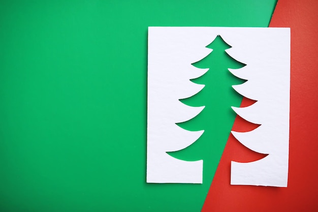 Photo christmas tree paper cutting design papercraft card. white, red and green color