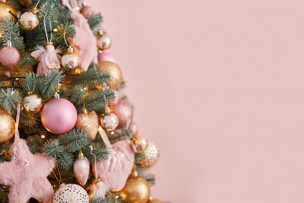 Christmas tree in pink background