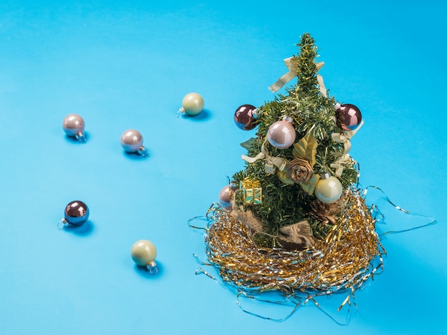 Christmas tree and scattered glass balls.