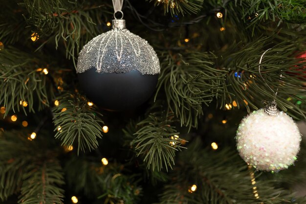 Christmas tree toy, ball on the christmas tree, lights of\
garlands, christmas mood