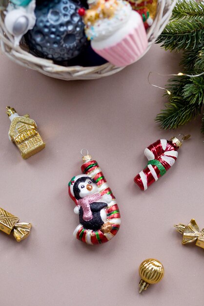 Christmas tree toy penguin on the table.