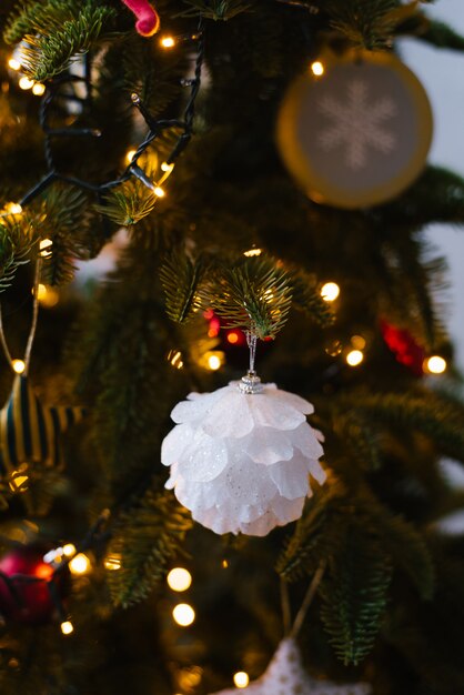 Christmas tree toy white ball on Christmas tree