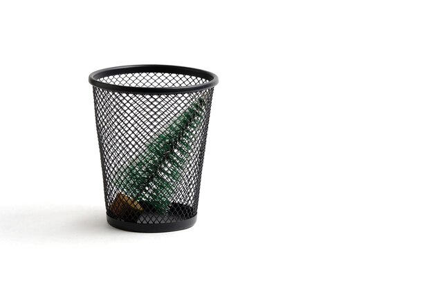 Christmas tree was thrown in trash Concept completing winter holidays