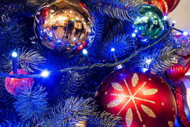 Christmas tree with beautiful xmas decoration in blurry background, bokeh, close up, copy space(text space)