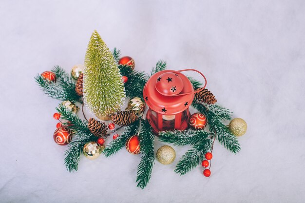 Christmas tree with decoration on a wooden table.