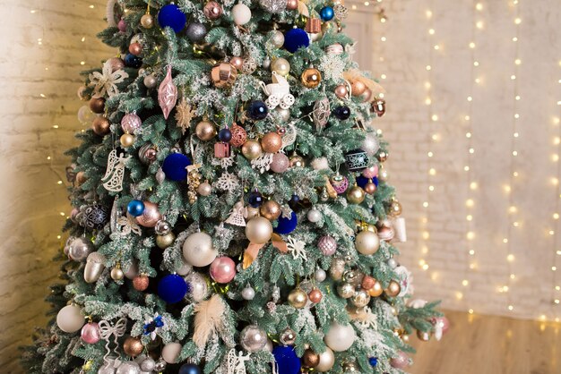 Christmas tree with garlands and toys