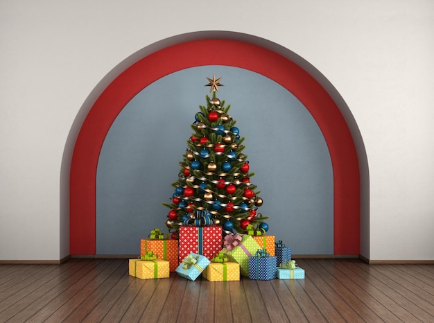 Christmas tree with gift against arch wall