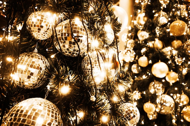 Christmas tree with gold ball and bokeh lights background