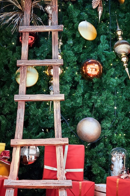 Photo christmas tree with leather and gifts