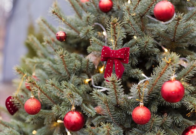 Christmas tree with red decorations lights