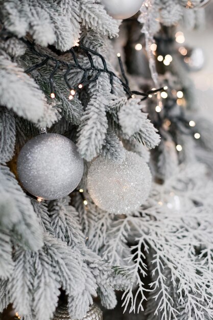 Christmas tree with silver white decorations