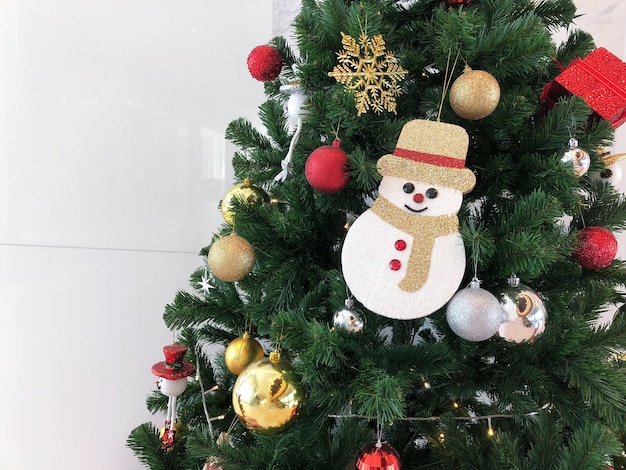 Christmas tree with snow man decoration.