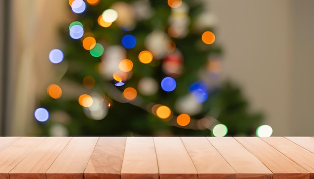 Christmas tree with top wood table and Blur background before Christmas day