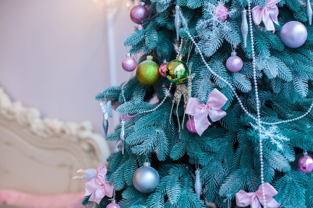 Christmas tree with toys and balls.